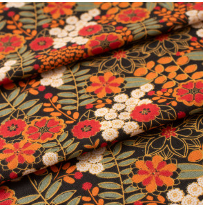 Tissu-coton-fleuri-orange-sur-fond-noir