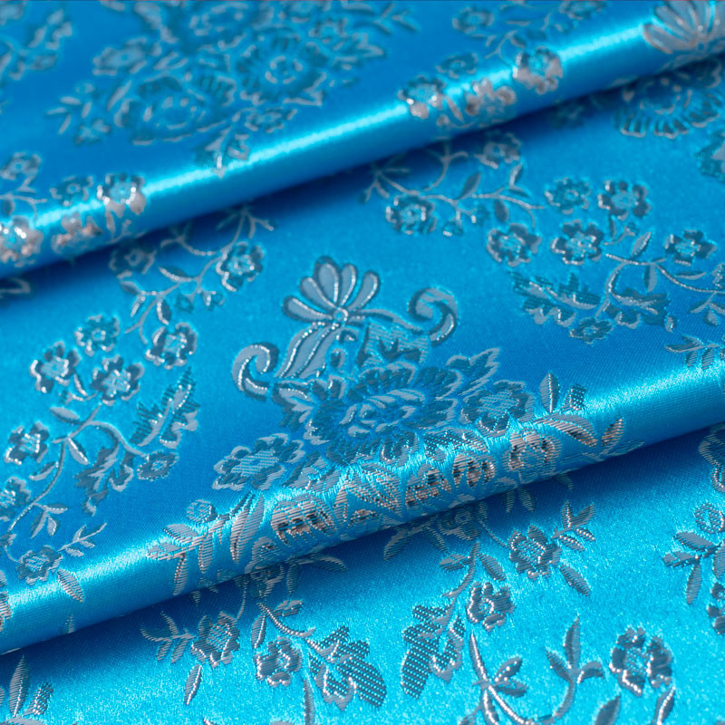 Tissu-jacquard-lurex-fleur-argent-turquoise