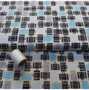 Coupon-2m50-stof-katoen-made-in-the-U.S.A.-blauwe-koffers-op-witte-achtergrond
