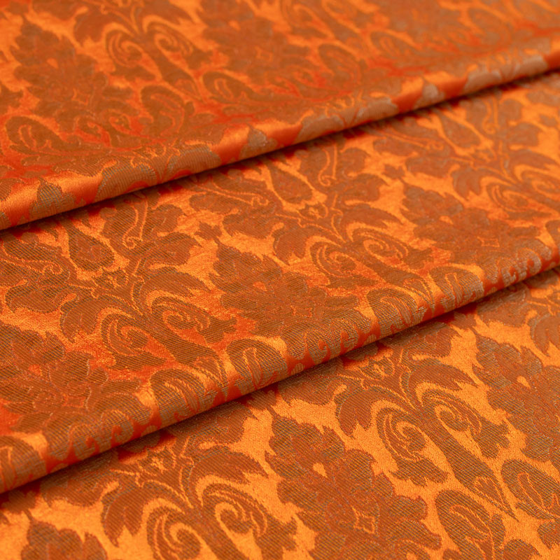 Stof-brokaat-90cm-orange-en-goud-klassiek-patroon