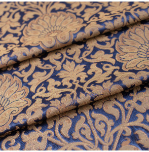 Stof-brokaat-90cm-blauw-en-goud-
met-bloemen