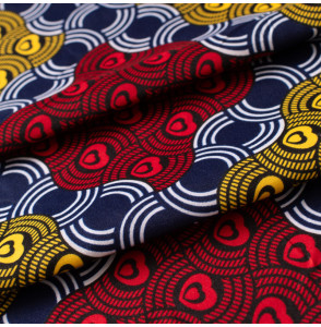 Tissu-esprit-wax-géométrique-bleu-rouge-et-jaune