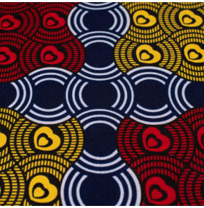 Tissu-esprit-wax-géométrique-bleu-rouge-et-jaune