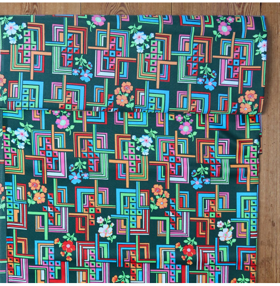 Coupon-polyester-1M10-satiné-motif-floral-et-géométrique-sur-fond-vert