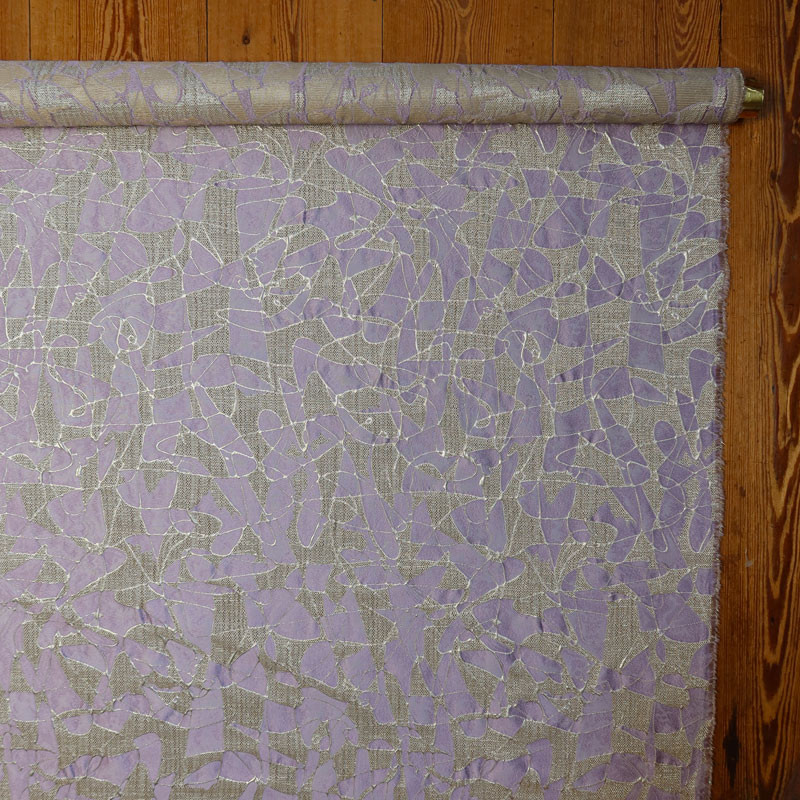 Coupon-jacquard-1M50-haute-couture-mauve-op-een-linnenlook-ondergrond-met-lurex