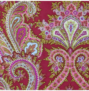 Coupon-katoen-3M-Made-in-Italy-gele-en-roze-indianenmotieven-op-een-bordeauxrode-achtergrond