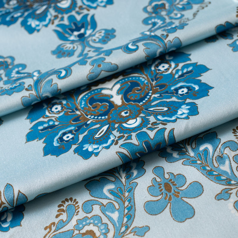 Vintage-meubelstof-blauwe-vegetatie-op-een-blauwe-achtergrond