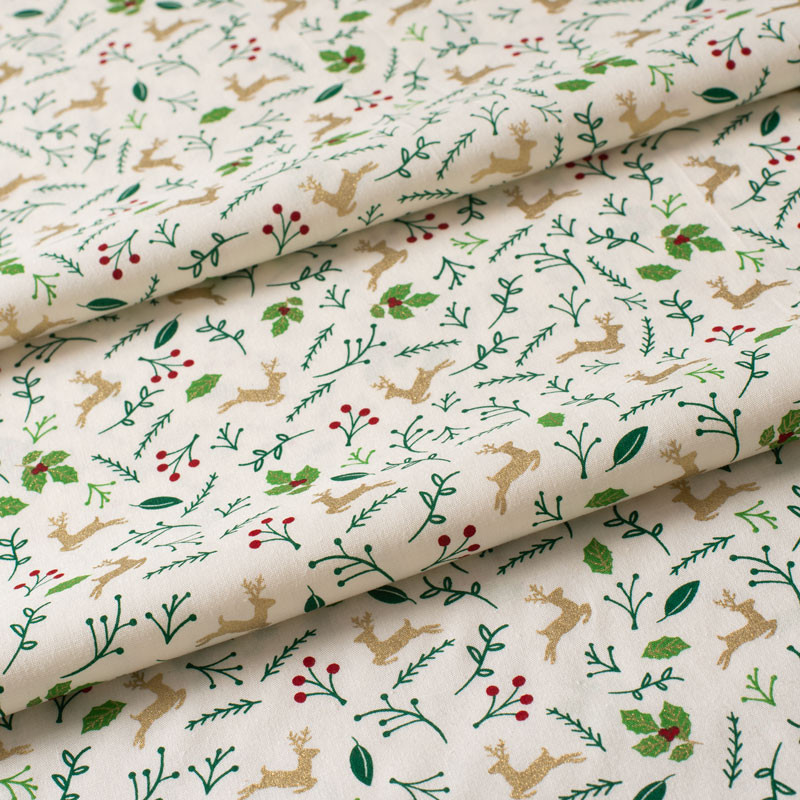 Tissu-coton-blanc-marine-Noël-renne-doré