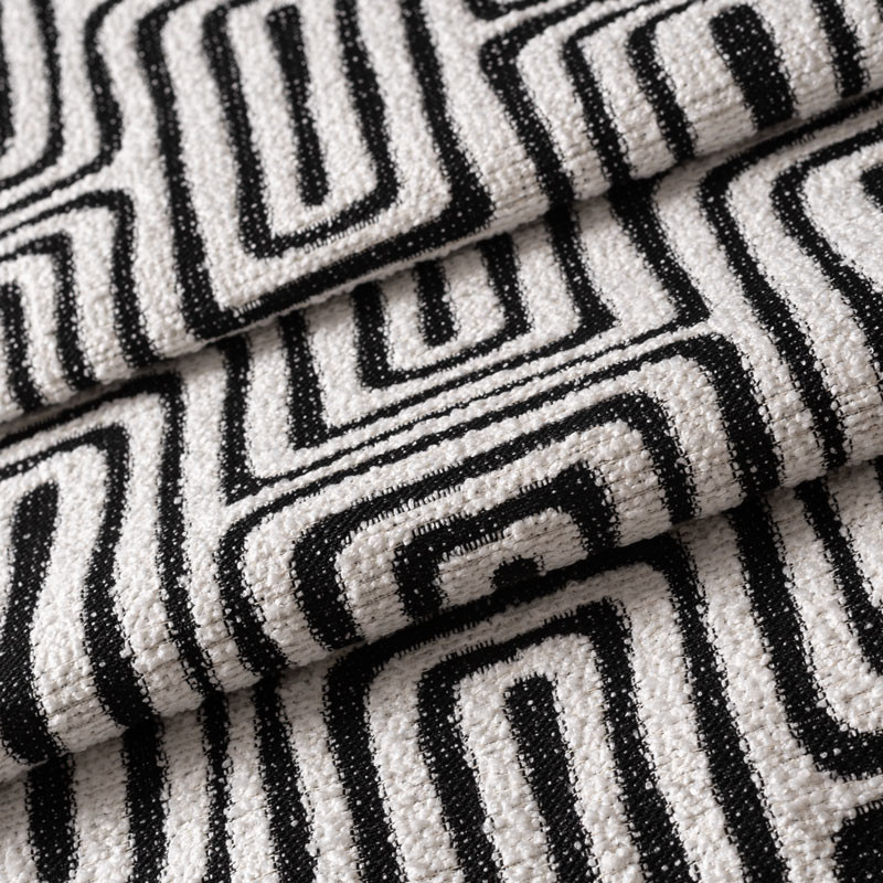 Tissu-structuré-bouclette-ethnique-noir-et-blanc