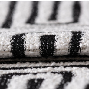 Tissu-structuré-bouclette-ethnique-noir-et-blanc
