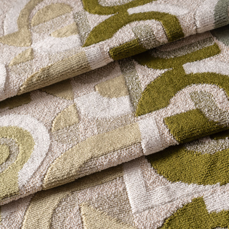 Fluweel-stof-geometrisch-groen-en-bouclette