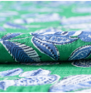 Tetra-Stof-met-bloemen-blauw-achtergrond-groen