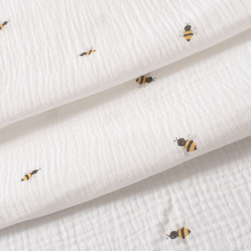 Tissu-tetra-double-gaze-blanc-cassé-imprimé-abeilles