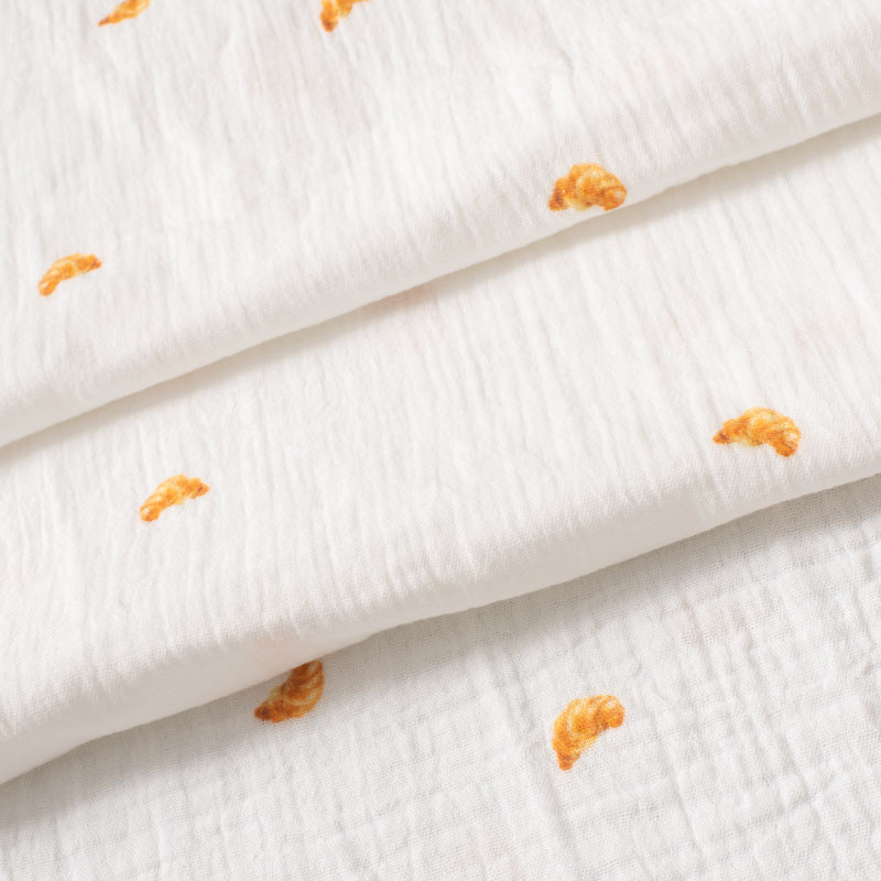 Tissu-tetra-double-gaze-blanc-cassé-imprimé-croissant