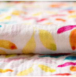 Tissu-double-gaze-imprimé-feuillage-multicolore-sur-fond-blanc