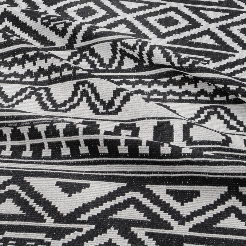 Tissu-jersey-lourd-ethnique-noir-blanc
