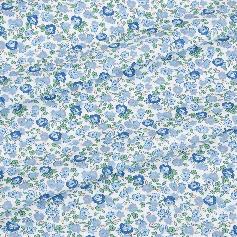 Tissu-coton-blanc-fleuri-bleu