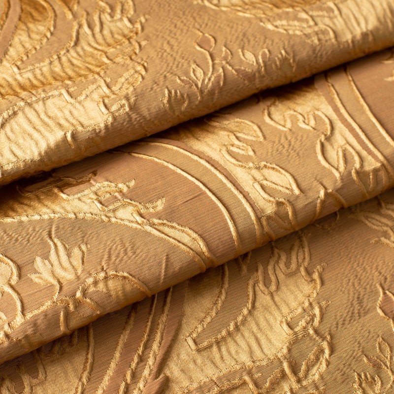 Jacquard-stof-van-katoen-en-zijde-oker-en-goud-met-plantenmotief