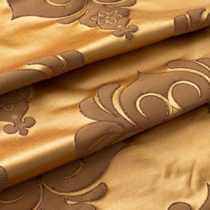 Jacquard-stof-van-katoen-en-zijde-goudkleurig-met-medaillon