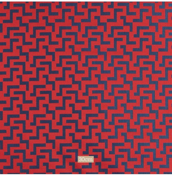 Jacquard-stof-met-geometrisch-motief-rood-en-blauw