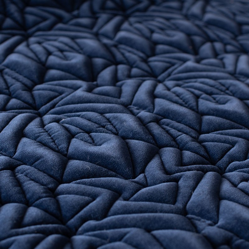 Tissu-ameublement-velours-matelassé-bleu-foncé