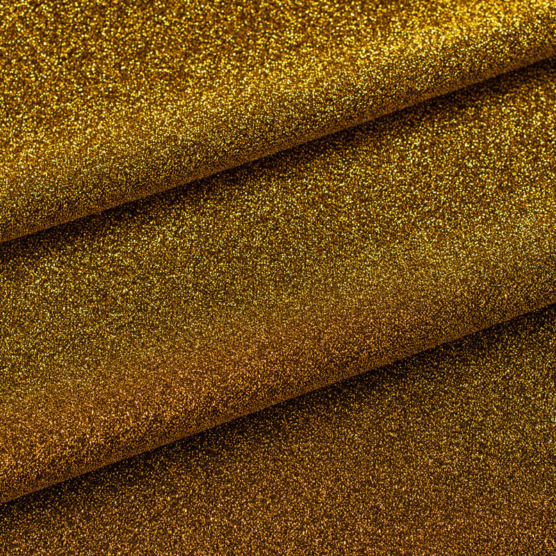 Fijne-jersey-stof-in-goud-met-glitters
