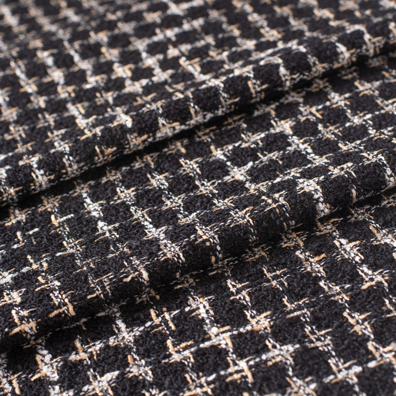 Haute-couture-tweed--geweven-in-Frankrijk-zwart-en-wit