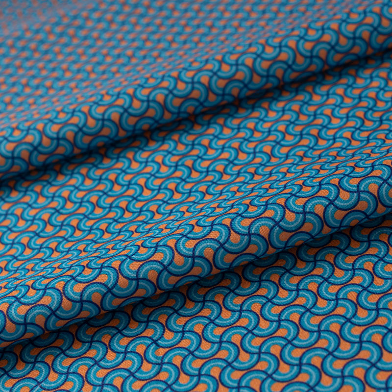 Tissu coton orange entrelacs turquoise